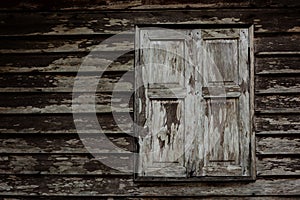 Old grunge wooden window of Thai house