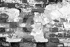 Old grungy brick wall texture in black and white