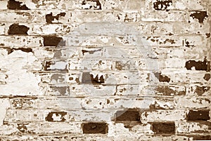 Old grungy brick wall texture with blur effect in brown tone