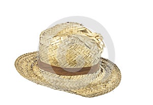 Old grungy straw hat on white background.