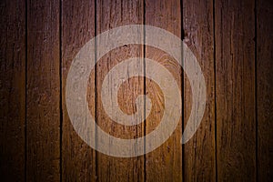 Old grungy and weathered brown wood surface wall plank texture background marked by damages outdoors