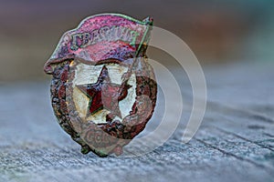 Old guards soviet medal on a gray table