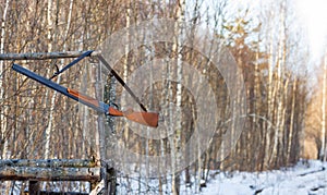 Old gun on hunting tower