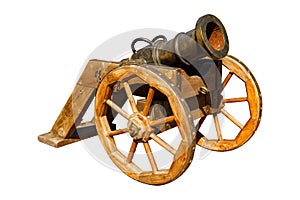 old gun on wooden wheels isolated on a white background