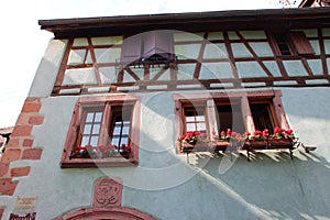 old half-timbered house in a village (riquewihr) in alsace (france)