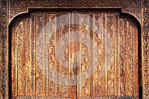 Old hand-carved wooden monastery door from Romania