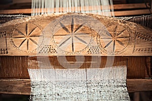 An old hand-weaving vintage wooden loom