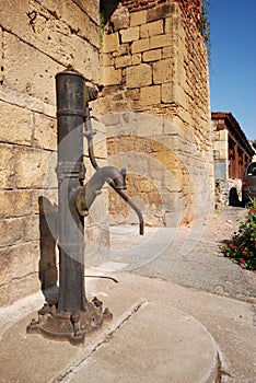 An old hand worked water pump in Greece