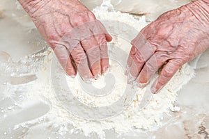 Old hands in flour