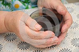 Old Hands warming with cap of tea