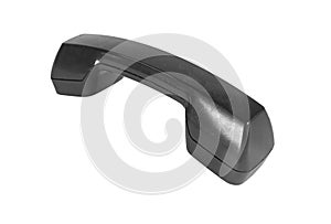 Old handset of black color isolated on a white background