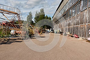 Old hangar at the airport with items for aviation maintenance