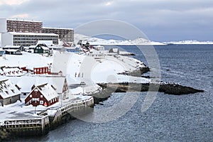 Old harbor covered in snow, Nuuk