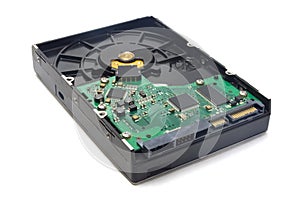 Old hard drive closeup on white background