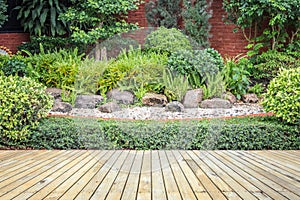 Wooden decking or flooring and plant in garden decorative photo
