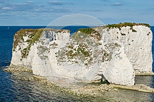 Old Harry Rocks are three chalk formations, located at Handfast Point, on the Isle of Purbeck in Dorset, southern