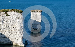 Old Harry Rocks are three chalk formations, located at Handfast Point, on the Isle of Purbeck in Dorset, southern