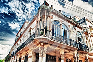 Old Havana building detail against blue sky