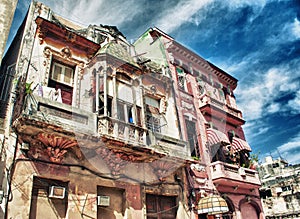 Old Havana colonial building with crumbling balconies