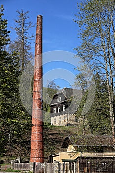 Old heat station unused tall brick chimney