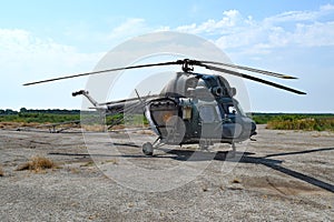 Old helicopter spraying fields