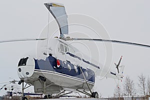 Old helicopter in winter