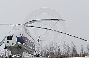 Old helicopter in winter