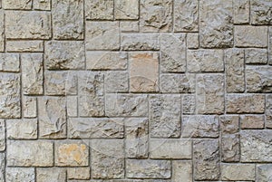 Old hewn stone wall, beautiful background texture