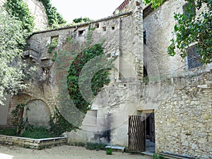 Old and high walls and towers of a medieval castle