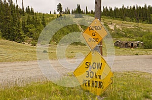 Old highway signs in the Yukon