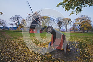 Old historic cannon near old historic windmill, Copenhagen, Denmark, Scandinavia