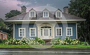 Old historic house on a rainy day in Saint-Jean-Port-Joli a special place in Québec\'s