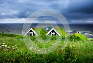 Old historic houses on the field in Iceland. Natural Icelandic background. Travelling on Iceland. Famous place.