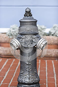 Old historic hydrant with decorations