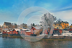 Old historic Porvoo, Finland with wooden houses and medieval stone and brick Porvoo Cathedral at blue hour sunrise