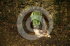 Old historic ruins of Scharfeneck castle with stone window and sun light. Inside a historic ruin. An abandoned haunted castle.