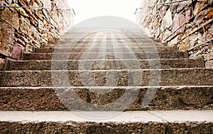 Old historic stone stairs, leading up to the sun lights