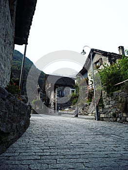 Old historic traditional schist stone rock buildings houses in Sonogno village Verzasca Valley Ticino Switzerland