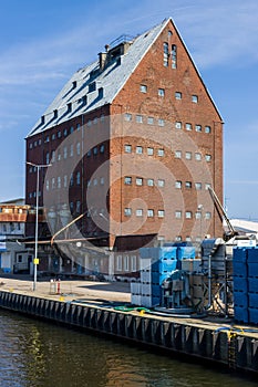 Old historic warehouse at the port of Kohlberg, Poland