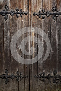 Old historic wooden decorated doors, background