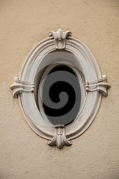 Old historical building with a round window