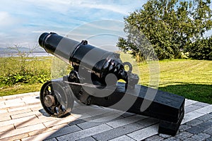 Old historical cannon at Le MusÃ©e maritime du QuÃ©bec photo