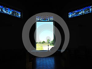 Cross in Cross hill near Siauliai town by new church window, Lithuania