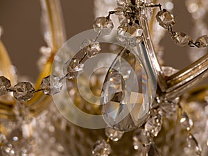 old historical crystal ceiling light in a palace