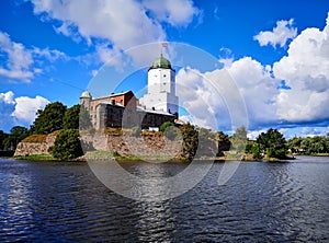 An old historical medieval castle built in the 13th century with the Olaf donjon tower. Russia, the city of Vyborg