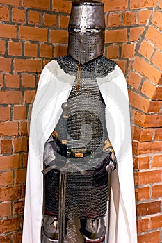 Old historical medieval iron knight armor for ancient warriors protection in combat. Traditional past fighter heavy metal defense