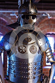 Old historical medieval iron knight armor for ancient warriors protection in combat. Traditional past fighter heavy metal defense