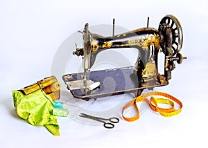 Old, historical sewing machine, sissers and equipment