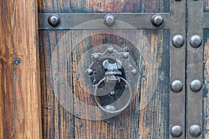 Old historical wooden door with heavy iron fittings, Germany