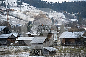 Old Historical Wooden houses in the Carpathian mountains at Winter. Vorokhta, Ukraine